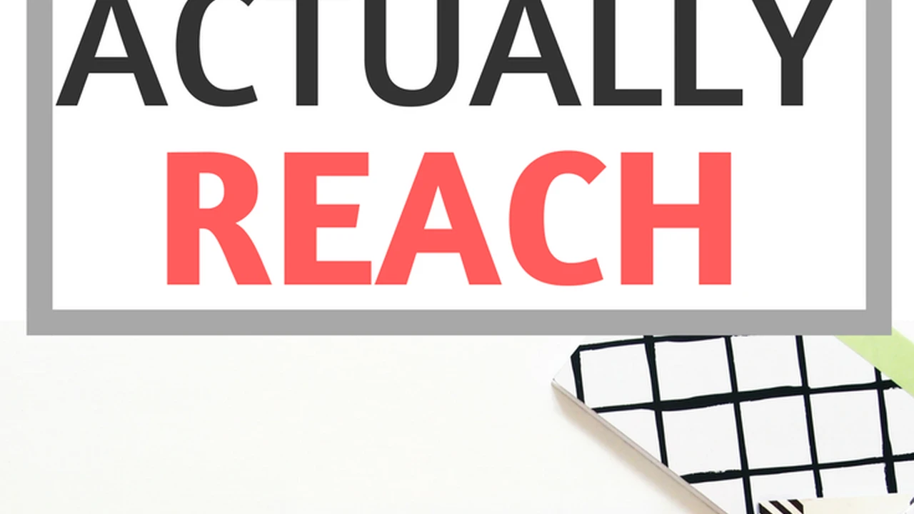 Close up on a plate of mashed potatoes, topped with baked pork chops with cream of mushroom soup, and a side of green beans.