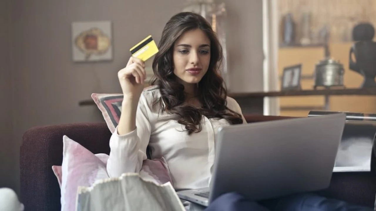 overhead view of corned beef sliced and on a platter with cabbage, potatoes, and carrots
