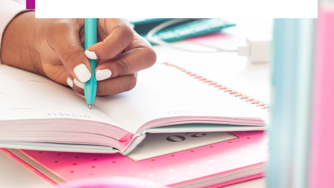 Close up on a plate of mashed potatoes, topped with baked pork chops with cream of mushroom soup, and a side of green beans.