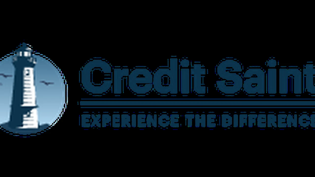 Close up on a plate of mashed potatoes, topped with baked pork chops with cream of mushroom soup, and a side of green beans.